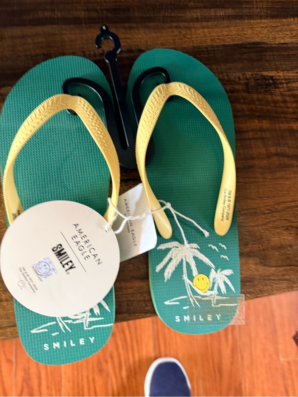 American Eagle Outfitters Teal Flip Flops with Yellow Straps & Smiley Graphic